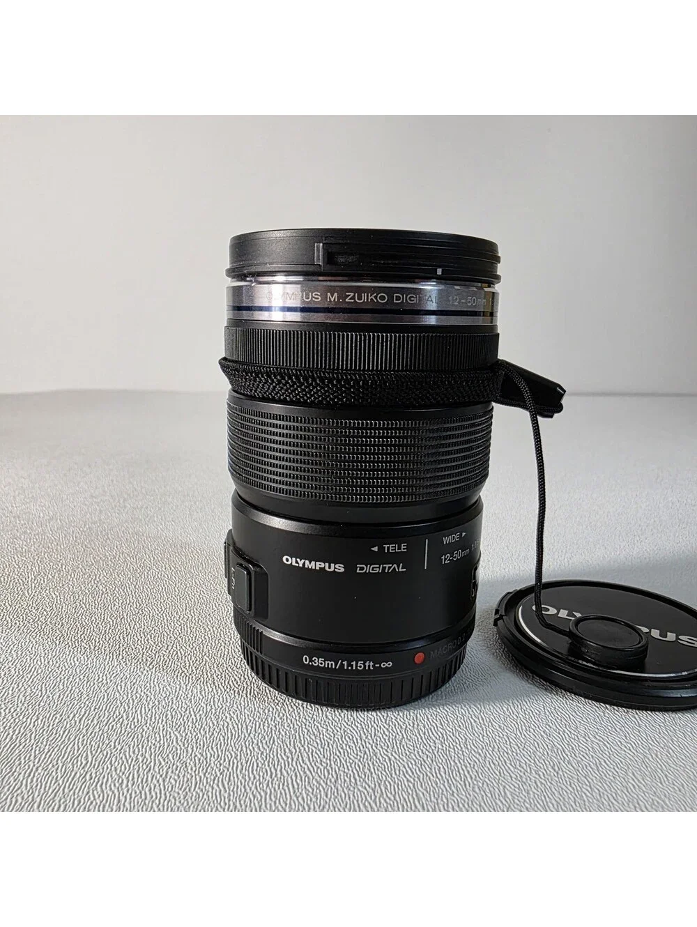 OLYMPUS M. Zuiko Digital 12-50mm f/3.5-6.3 EZ ED MSC Lens Both Caps